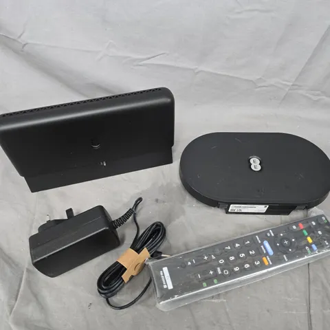 APPROXIMATELY 10 ASSORTED ELECTRICAL PRODUCTS TO INCLUDE ROUTERS, POWER SUPPLIES, REPLACEMENT REMOTE ETC 