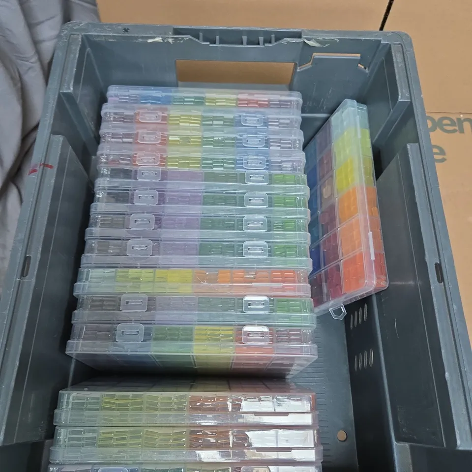 APPROXIMATELY 15 PACKS OF SMALL GLASS MOSAIC TILES IN ASSORTED COLOURS