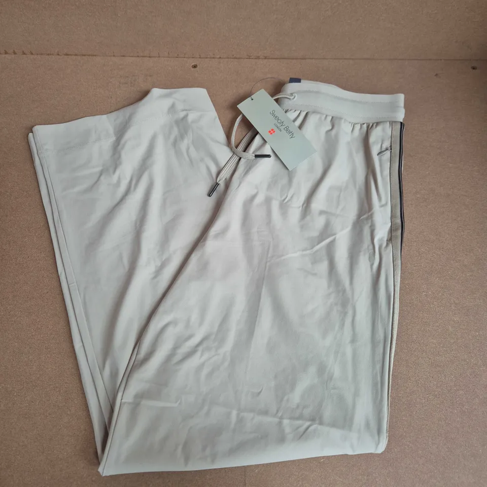 SWEATY BETTY EXPLORER SIDE STRIPE WIDE LEG 30" TROUSERS IN BARLEY BEIGE - SMALL