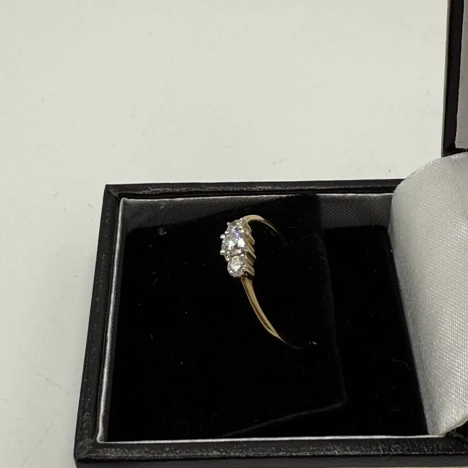 9CT GOLD THREE STONE RING SET WITH NATURAL DIAMONDS