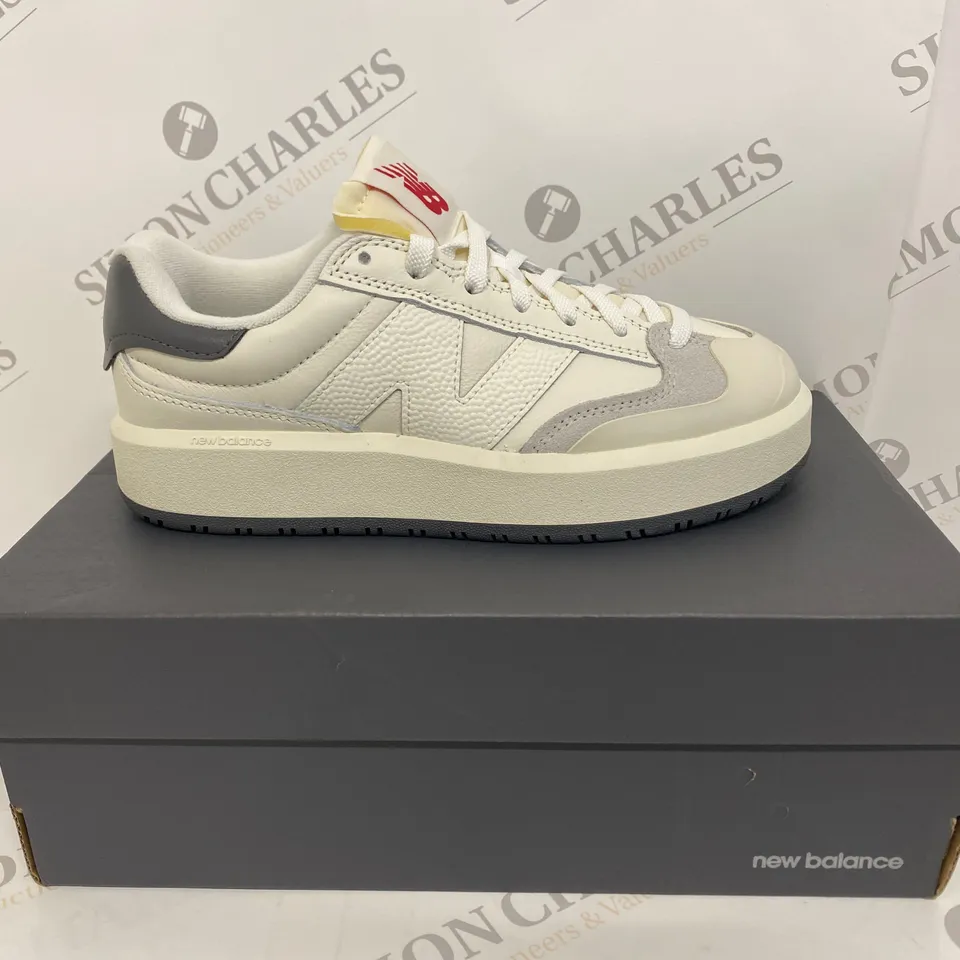 BOXED PAIR OF NEW BALANCE CREAM TRAINERS SIZE 5 