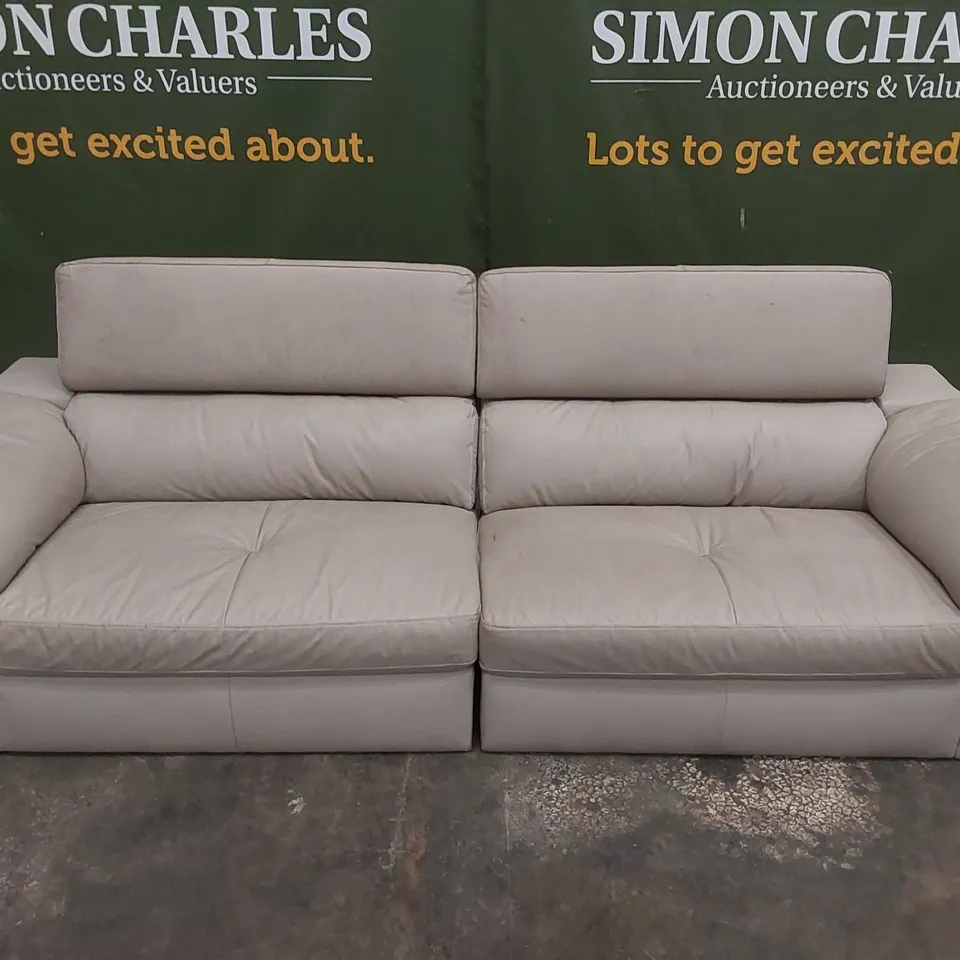 DESIGNER 4 SEATER LEATHER UPHOLSTERED SOFA WITH ADJUSTABLE HEADREST