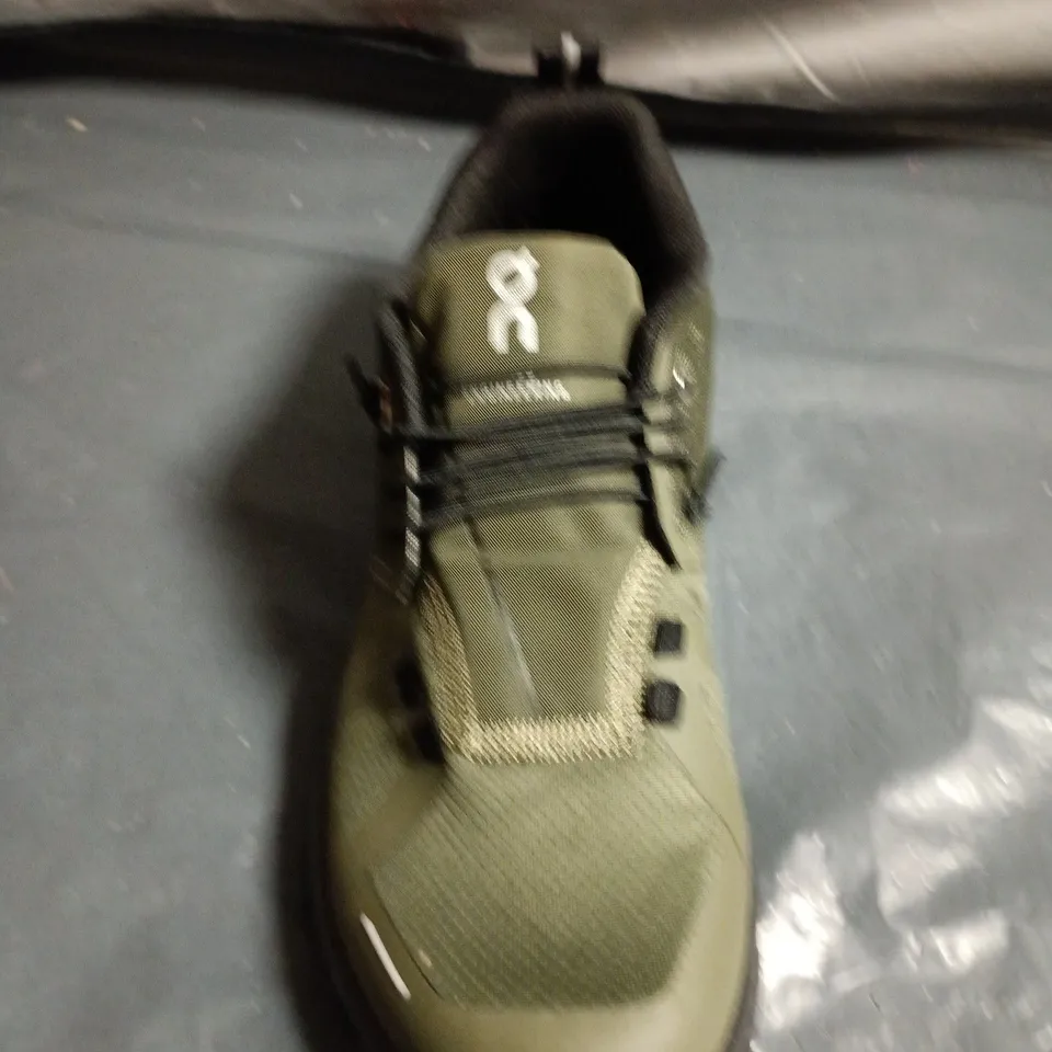 PAIR OF ON RUNNING OLIVE GREEN TRAIL SHOES – UK SIZE 7.5