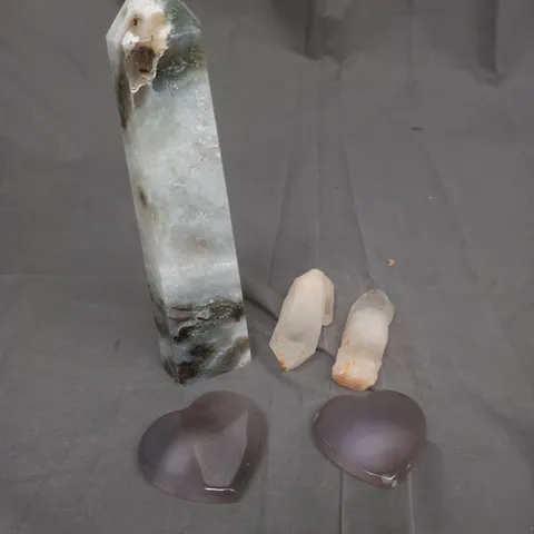 LARGE QUANTITY OF ASSORTED DECORATIVE ROCK SCULPTURES IN VARIOUS DESIGNS
