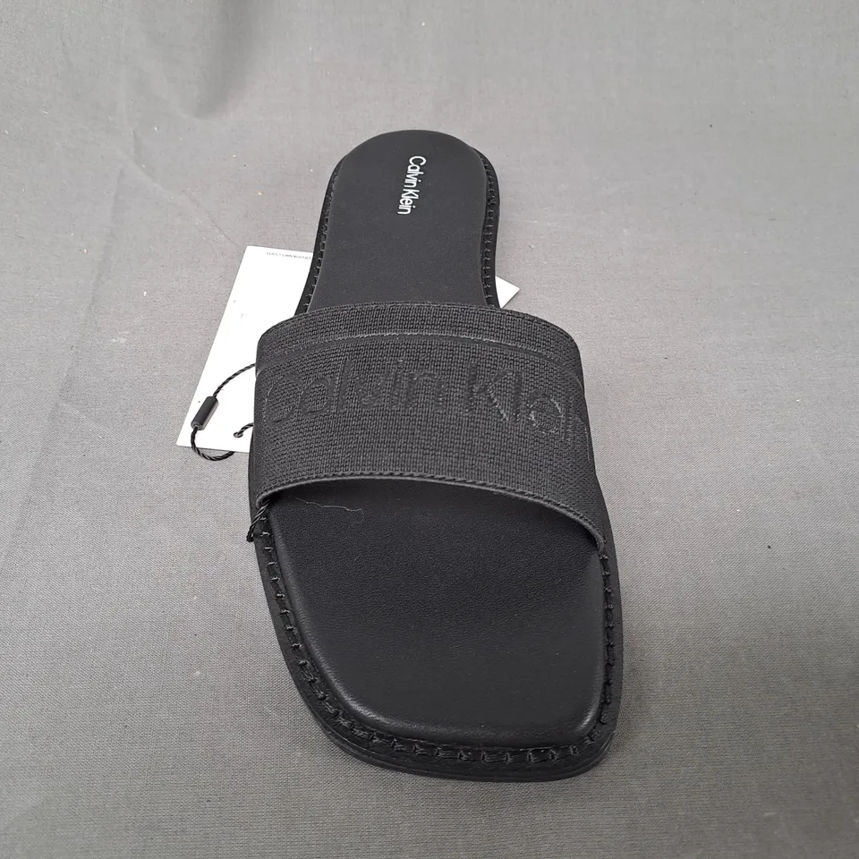 BOXED PAIR OF CALVIN KLEIN FLAT SLIDERS IN BLACK UK SIZE 6