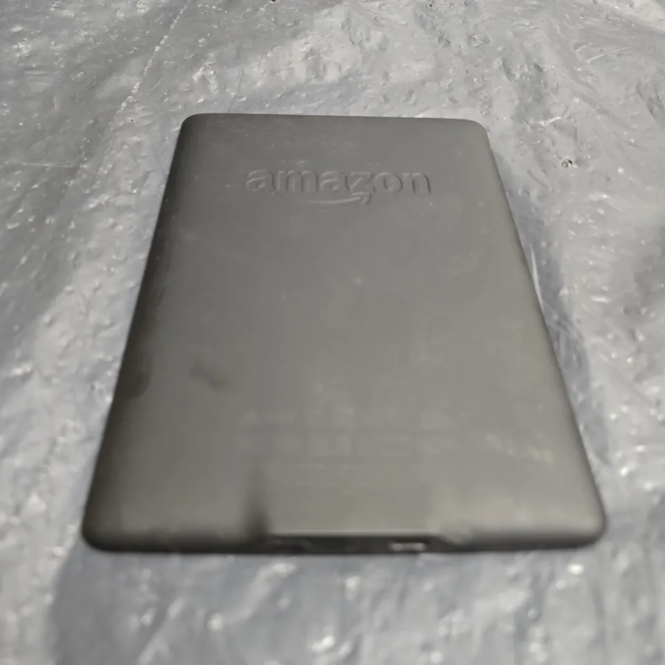 AMAZON KINDLE E-READER (BLACK) – BATTERY LOW ON SCREEN