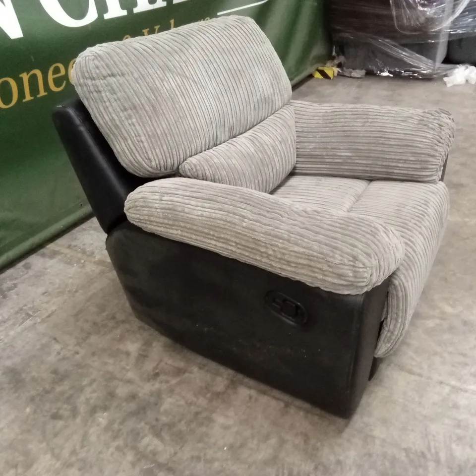 ARMSTRONG FABRIC AND FAUX LEATHER MANUAL RECLINER SOFA