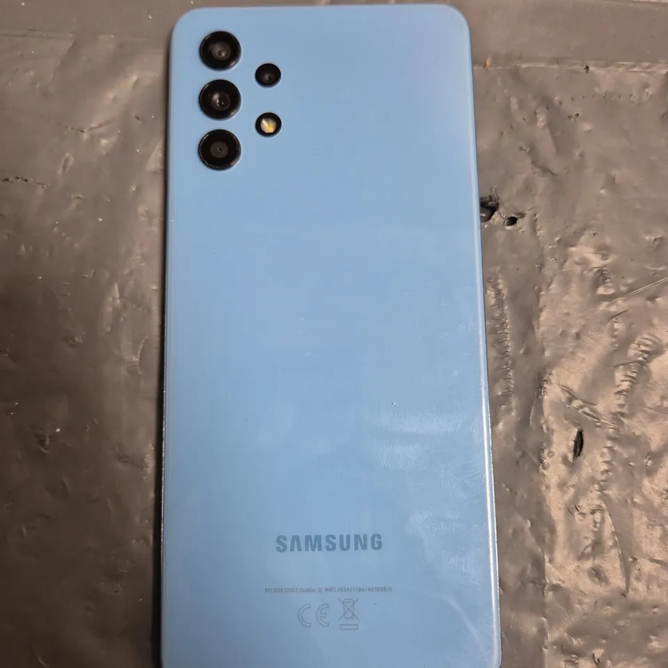 SAMSUNG SMARTPHONE IN LIGHT BLUE - MODEL UNSPECIFIED