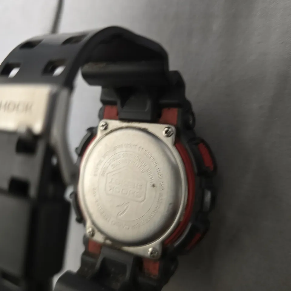 CASIO G-SHOCK BLACK SPORTS WATCH WITH RED ACCENTS – 200M WR, IN TIN BOX