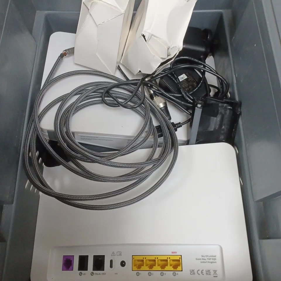 BOX OF APPROXIMATELY 10 ASSORTED ELECTRICXAL ITEMS TO INCLUDE ROUTERS , CABLES AND PLUGS