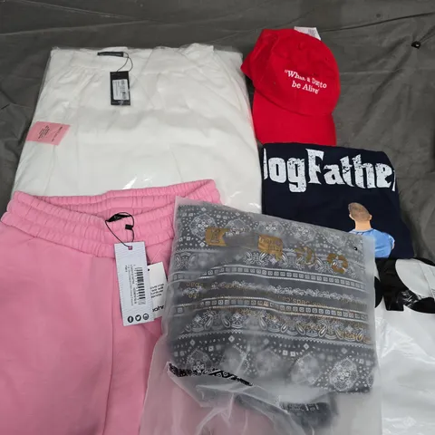 APPROXIMATELY 35 ASSORTED CLOTHING ITEMS IN VARIOUS SIZES, STYLES & COLOURS TO INCLUDE CAPS, T-SHIRTS, SKIRTS, ETC - COLLECTION ONLY