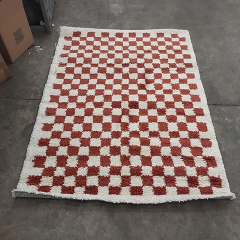 NOOR CHEQUERED BURNT ORANGE/CREAM RUG - APPROXIMATELY 170 x 120cm