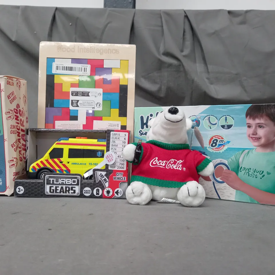 BOX OF APPROXIMATELY 20 ASSORTED TOYS AND GAMES TO INCLUDE BALANCING CHAIRS, WOOD INTELLIGENCE, COCA COLA POLAR BEAR, ETC - COLLECTION ONLY