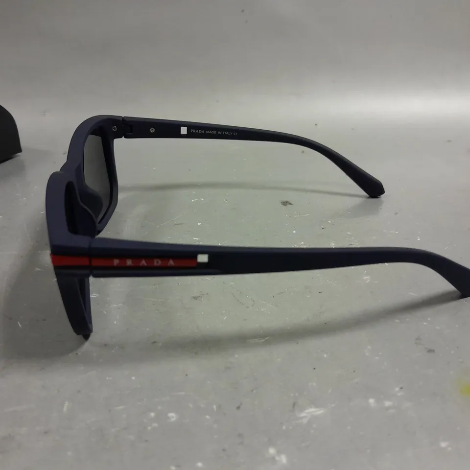 PRADA POLARISED GLASSES WITH NAVY FRAMES IN CASE