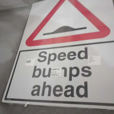 SPEED BUMPS AHEAD ROAD SIGN