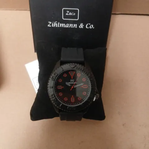 ZIHLMANN & CO. WRISTWATCH – BLACK DIAL WITH RED NUMERALS 