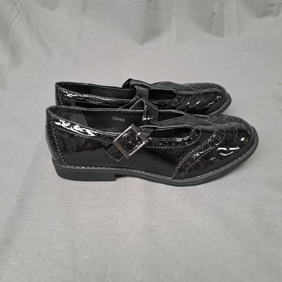BOX OF APPROXIMATELY 12 PAIRS OF GIRLS SCHOOL SHOES IN BLACK - VARIOUS SIZES
