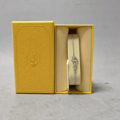 SWAROVSKI SILVER HYPERBOLA INFINITY AND HEART BRACELET