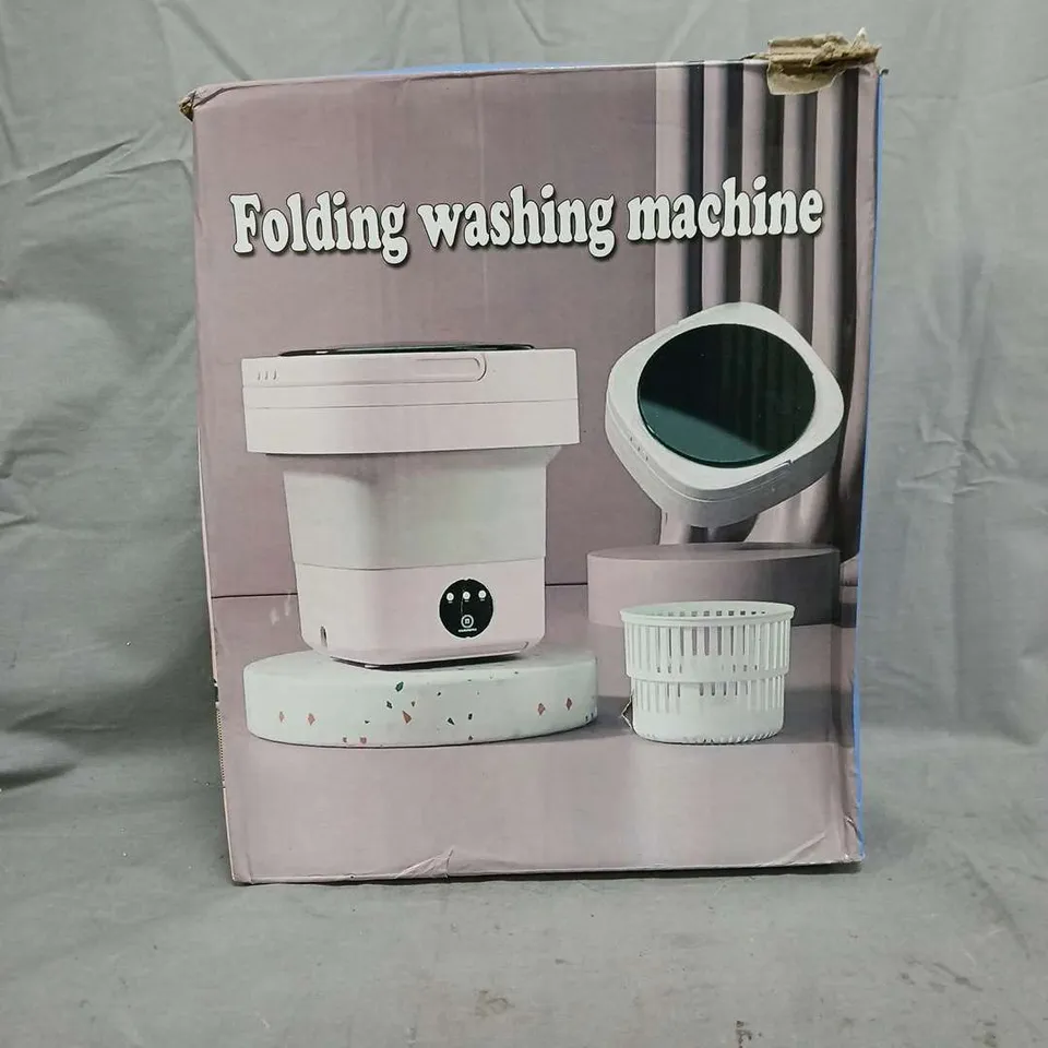 BOXED UNBRANDED FOLDING WASHING MACHINE