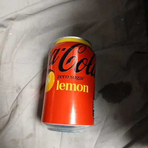 PACK OF APPROXIMATELY 17 COCA COLA LEMON CANS - 330ML