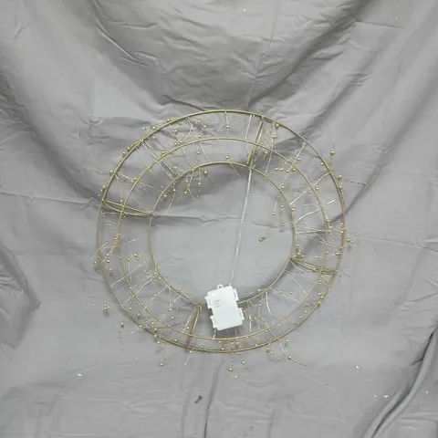 DECORATIVE CIRCULAR WIRE WALL ART WITH BEAD ACCENTS