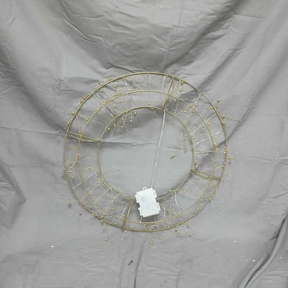 DECORATIVE CIRCULAR WIRE WALL ART WITH BEAD ACCENTS