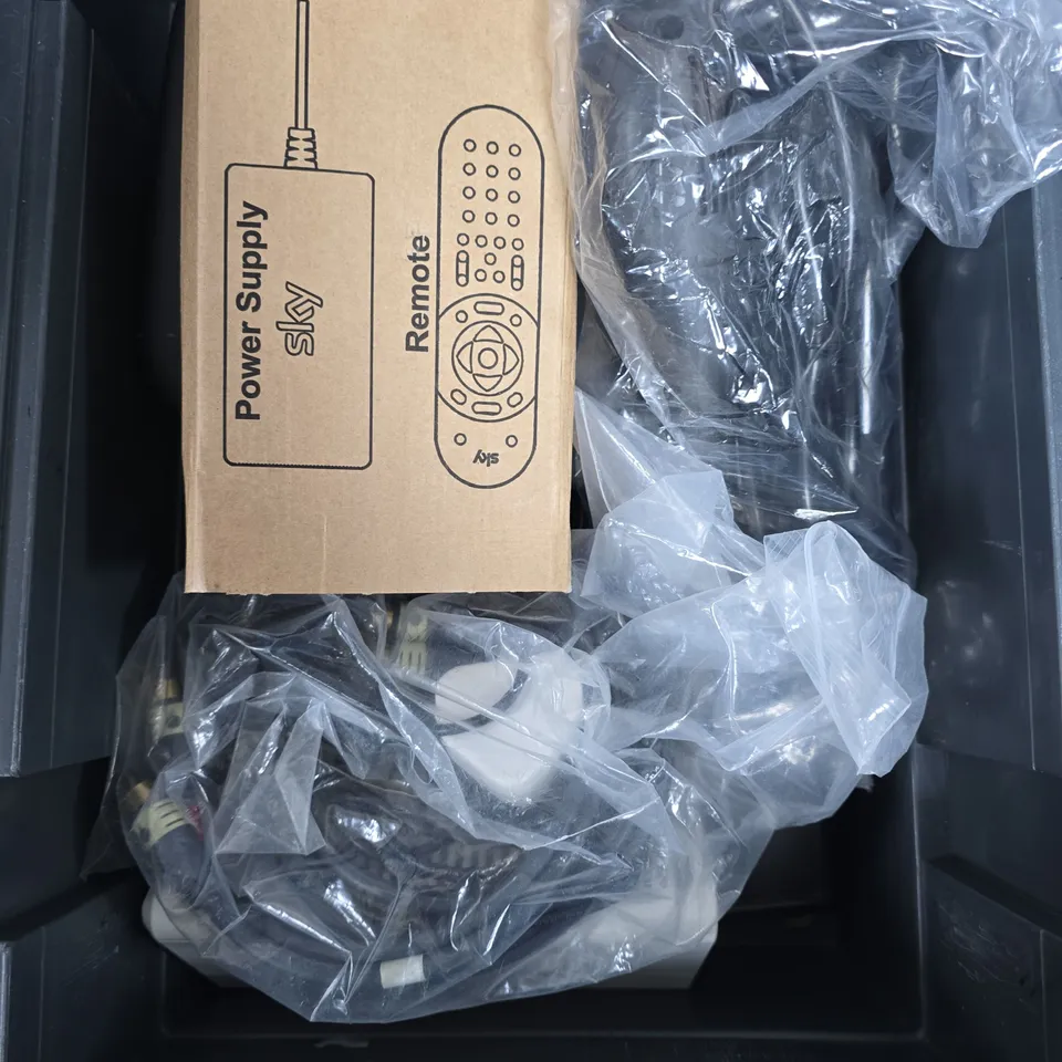 BOX OF ASSORTED CABLES AND MODEMS 