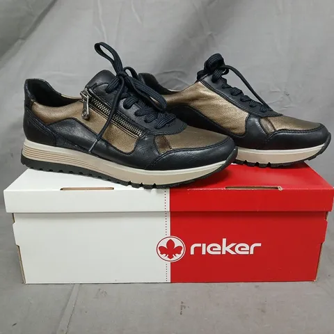 BOXED PAIR OF RIEKER SHOES IN BLACK/GOLD SIZE 6
