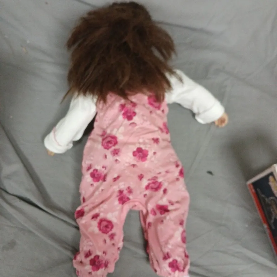 60CM DOLL IN PINK FLORAL JUMPSUIT WITH WHITE TOP