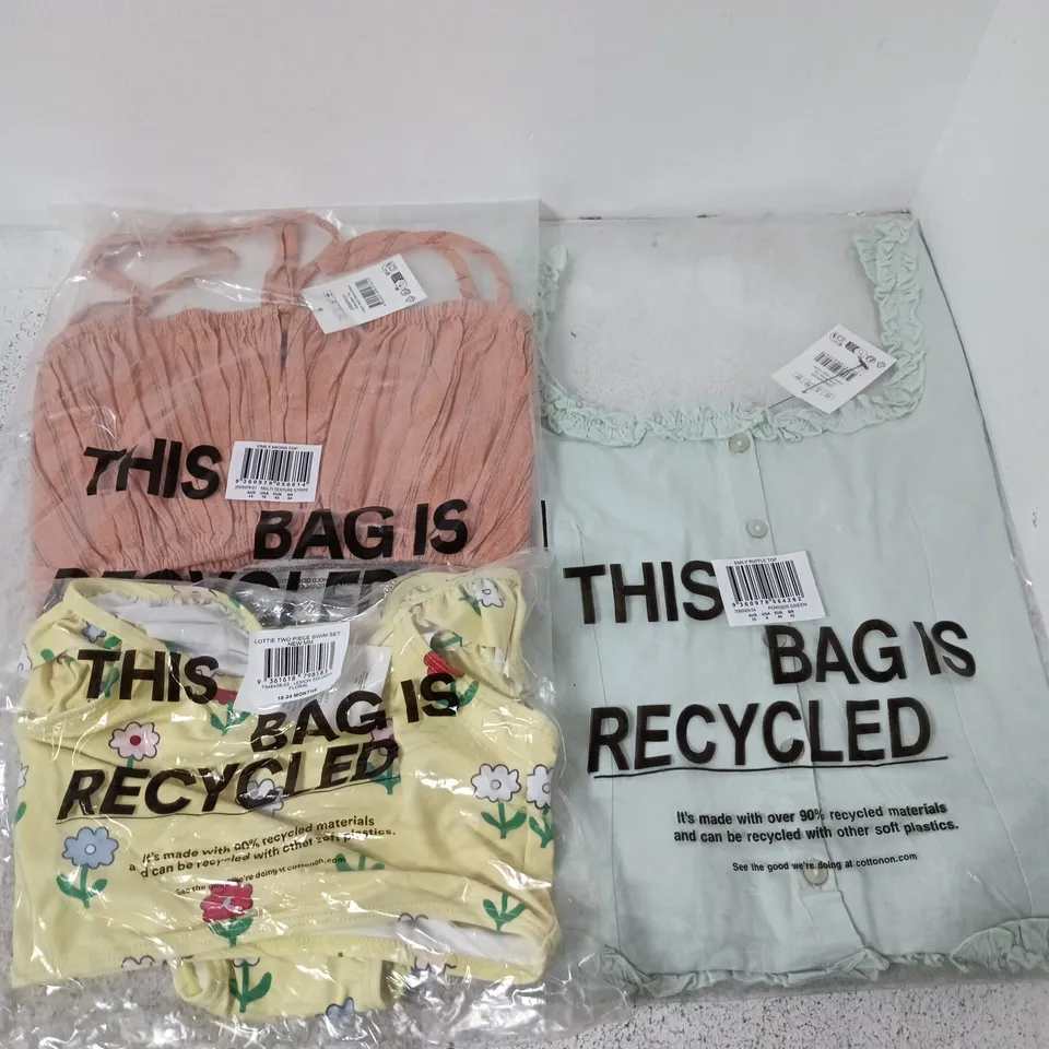 APPROXIMATELY 30 ASSORTED CLOTHING ITEMS IN VARIOUS SIZES, COLOURS & STYLES TO INCLUDE EMILY RUFFLE TOP, LOTTIE TWO PIECE SWIM SET, EMILY MICRO TOP, ETC