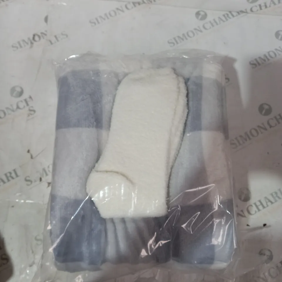 BOXED AND SEALED COZEE HOME THROW AND SOCK SET.