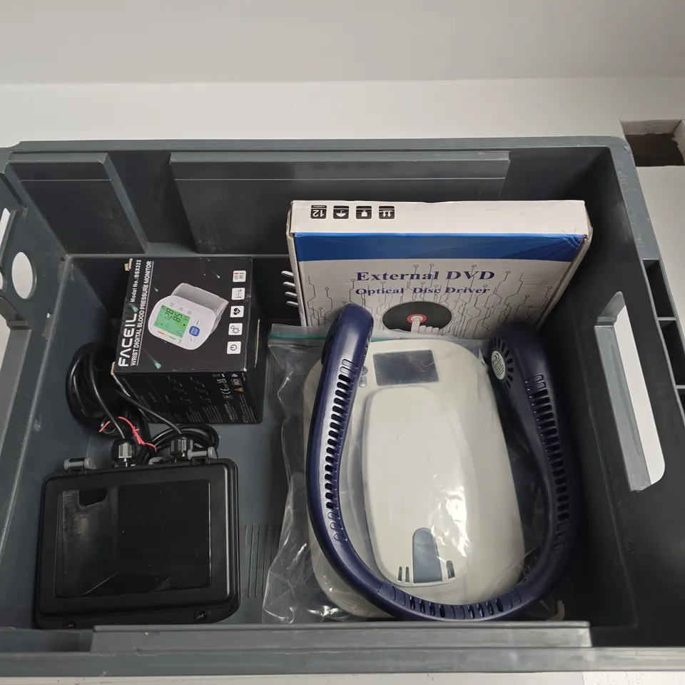 TOTE OF APPROXIMATELY 5 ASSORTED ITEMS INCLUDING FACEIL WRIST DIGITAL BLOOD PRESSURE MONITOR, EXTERNAL DVD OPTICAL DISK DRIVER AND A NECK WARMER