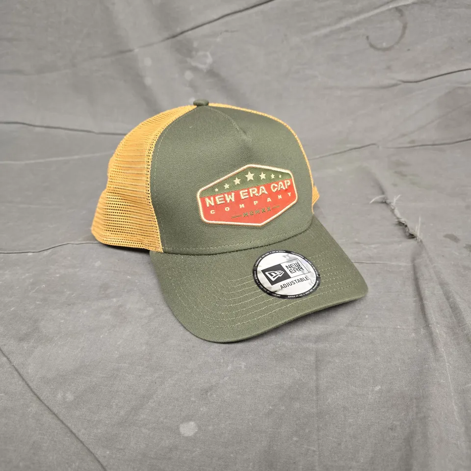 NEW ERA CAP COMPANY TRUCKER HAT – OLIVE GREEN FRONT, MUSTARD MESH – OSFM