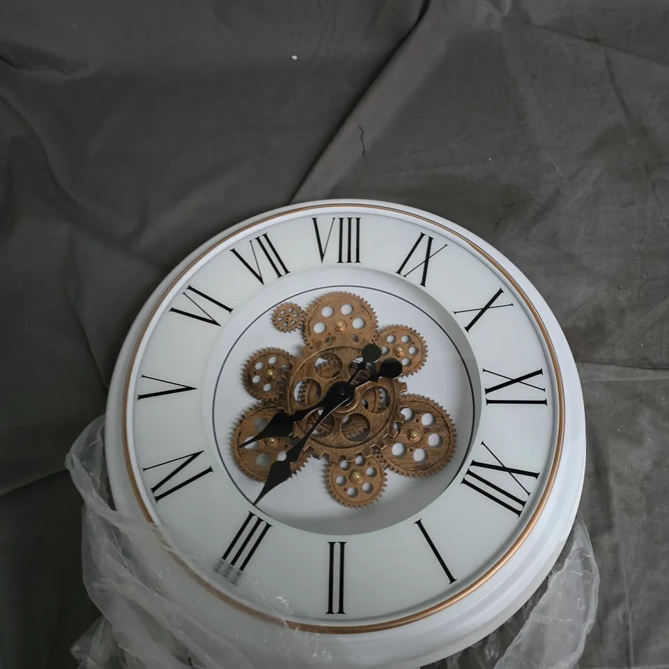 SKELETON WALL CLOCK WITH EXPOSED GEARS – WHITE DIAL, ROMAN NUMERALS