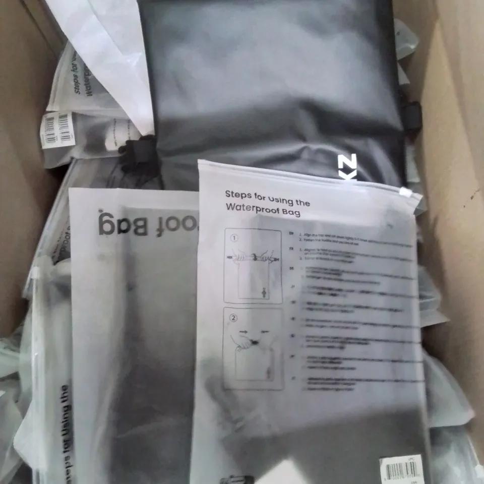 BOX CONTAINING LARGE AMOUNT OF WATERPROOF BAGS
