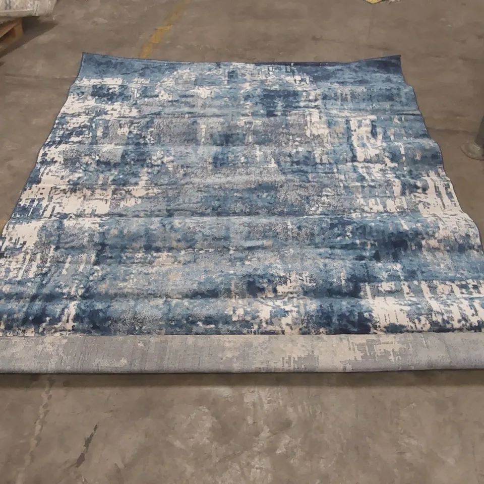STILLAGE CONTAINING APPROXIMATELY  25x ASSORTED DESIGNER RUGS - STILLAGE NOT INCLUDED