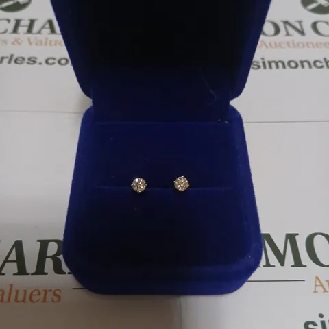 PLATINUM STUD EARRINGS SET WITH NATURAL DIAMONDS