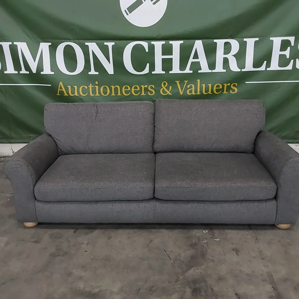 DESIGNER SOFA UPHOLSTERED IN SLATE GREY FABRIC