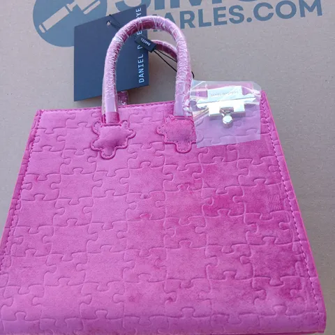 APPROXIMATELY THREE PINK QUILTED HANDBAG WITH PUZZLE-PIECE PATTERN 