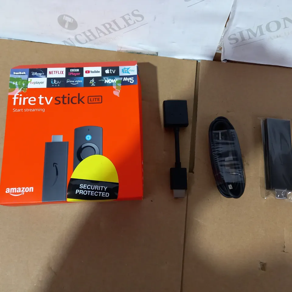 BOXED AMAZON FIRE TV STICK LITE