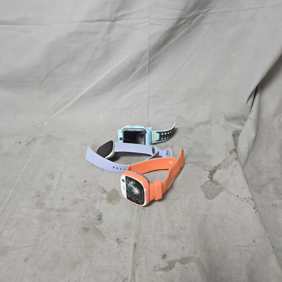 3 X SMART WATCHES, INCLUDING IMOO, SPACETALK AND FITBIT. DAMAGED