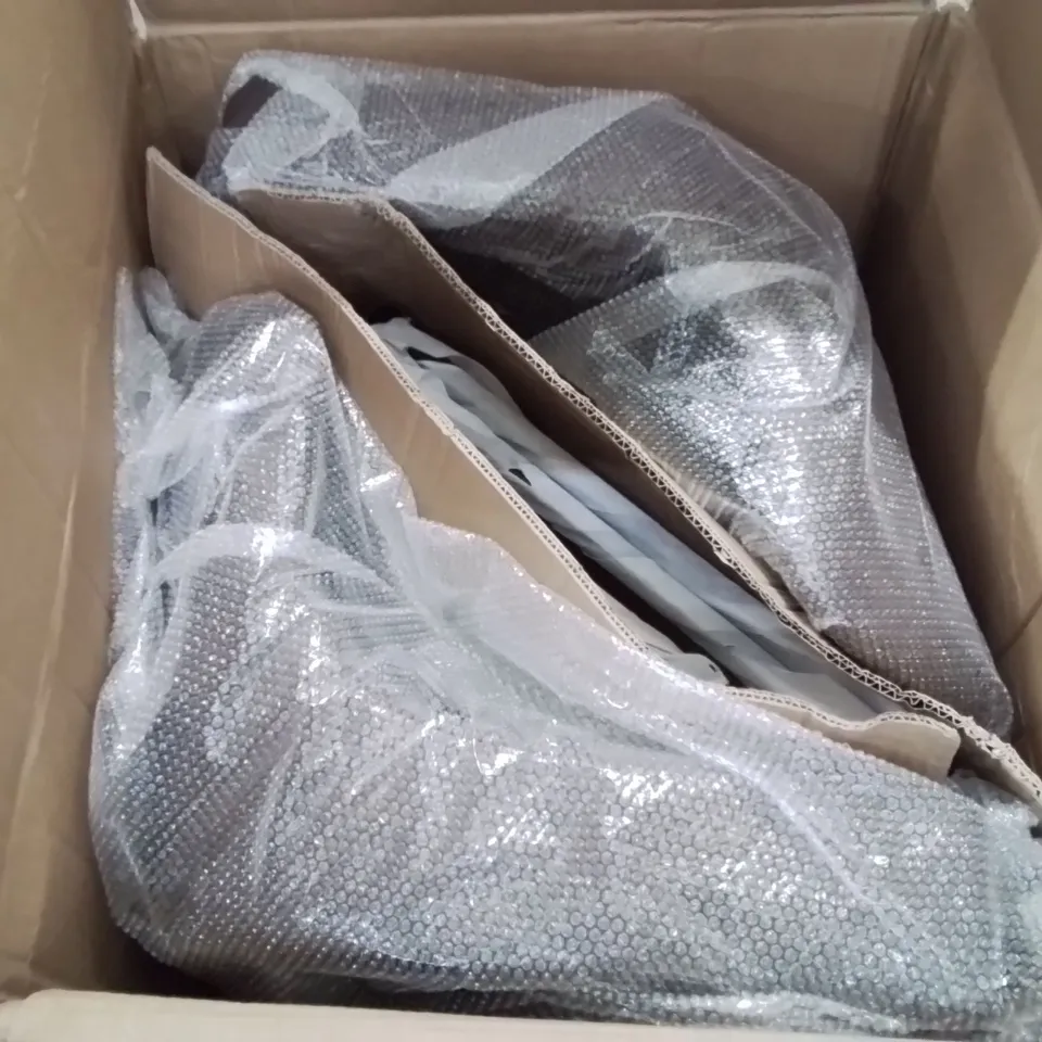 A BOXED PAIR OF BROWN FAUX LEATHER UPHOLSTERED SIDE/DINING CHAIRS