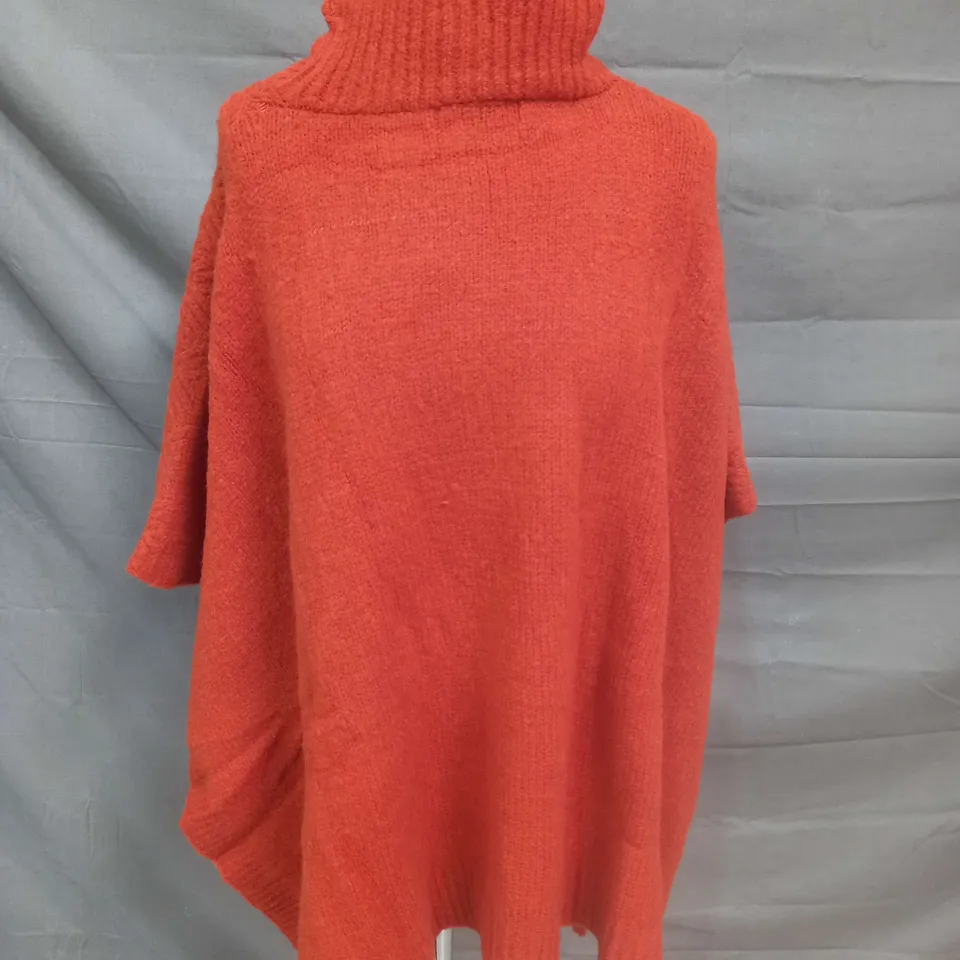 BRAKEBURN HERRINGBONE STITCH TASSELS PONCHO IN TERRACOTTA - ONE SIZE 