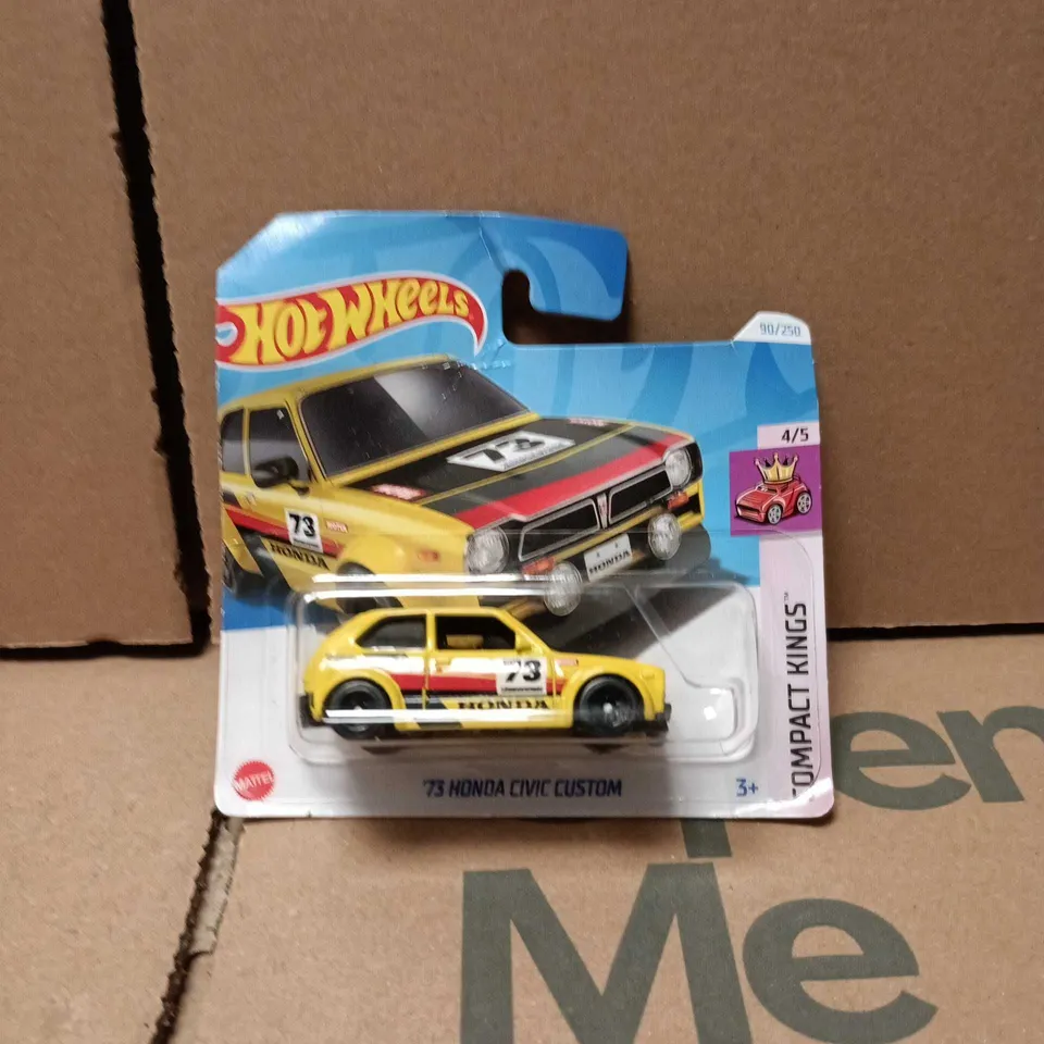 HOT WHEELS 73 HONDA CIVIC CUSTOM – YELLOW DIE‑CAST CAR IN BLISTER PACK