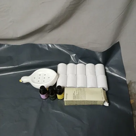 APPROXIMATELY 12 ASSORTED ITEMS TO INCLUDE TILL RECEIPT ROLLS, AROMATHERAPY BOTTLES, SOAP DISH, AESOP DROPS ETC 