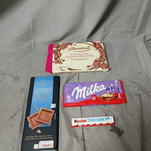 APPROXIMATELY 15 ASSORTED CHOCOLATE CONFECTIONERY ITEMS INCLUDING THORNTONS, MILKA, KINDER