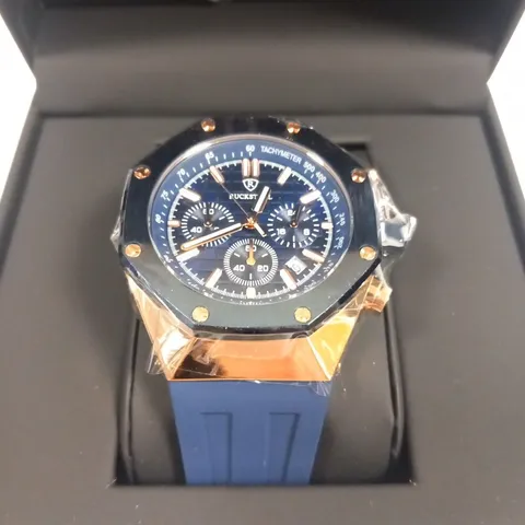 MENβS RUCKSTUHL CHRONOGRAPH R400 WATCH β GOLD COLOUR CASE β SILVER DIAL β 3ATM WATER RESISTANT β BLUE RUBBER STRAP