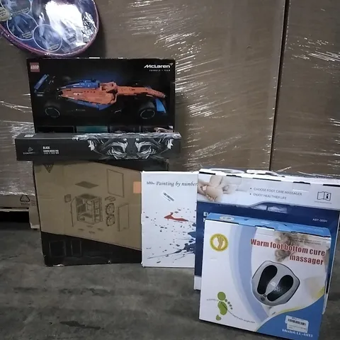 PALLET CONTAINING VARIOUS ASSORTED ITEMS TO INCLUDE: LOGO MCLAREN F1 CAR, FOOT MASSAGERS GAMING PC CASE, GAMING MOUSE MAT ETC.