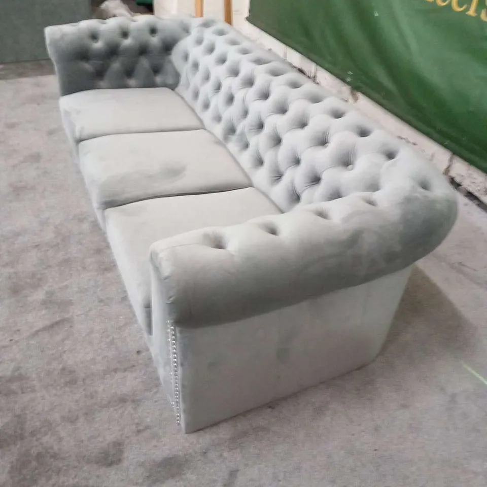 DESIGNER GREY VELVET EFFECT BUTTON BACK THREE SEATER SOFA WITH BUTTON BACK DETAIL
