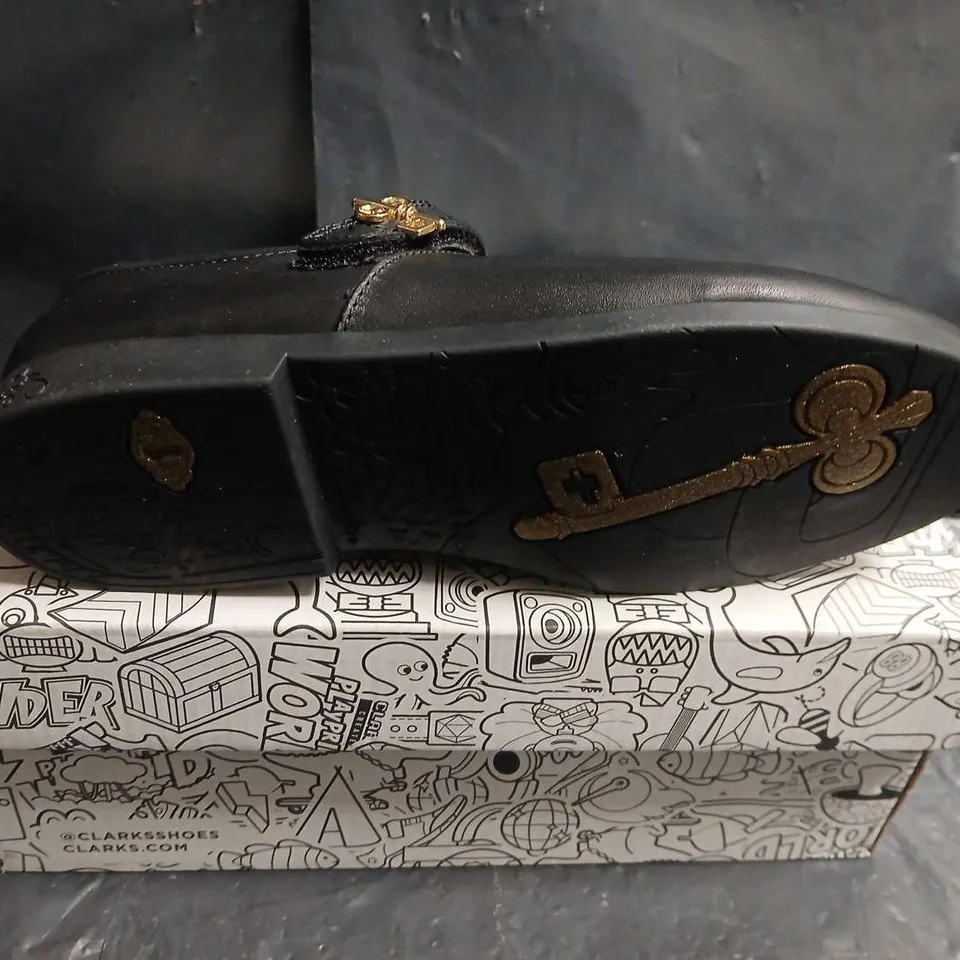 BOXED PAIR OF CLARKS KIDS' BLACK MARY JANE SHOES WITH STAR & MOON EMBROIDERY – UK SIZE 1.5